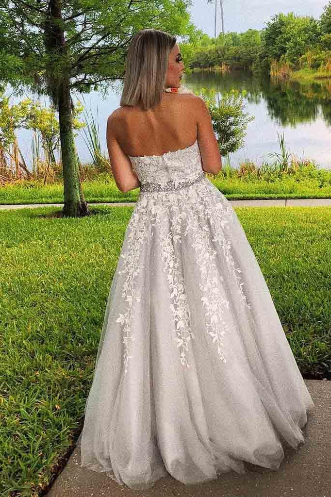 A charming high necked dance dress with a long lace formal dress