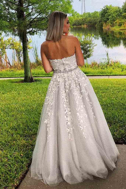 A charming high necked dance dress with a long lace formal dress