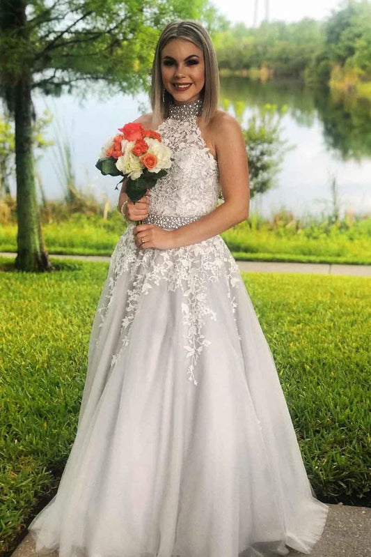 A charming high necked dance dress with a long lace formal dress