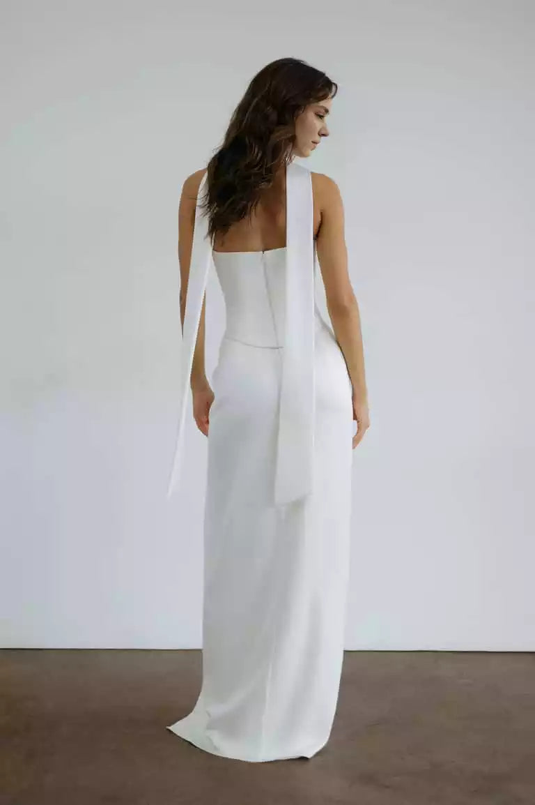 Classic and timeless tight corset with straight hemline and slit, adding charm to Evening Dresses