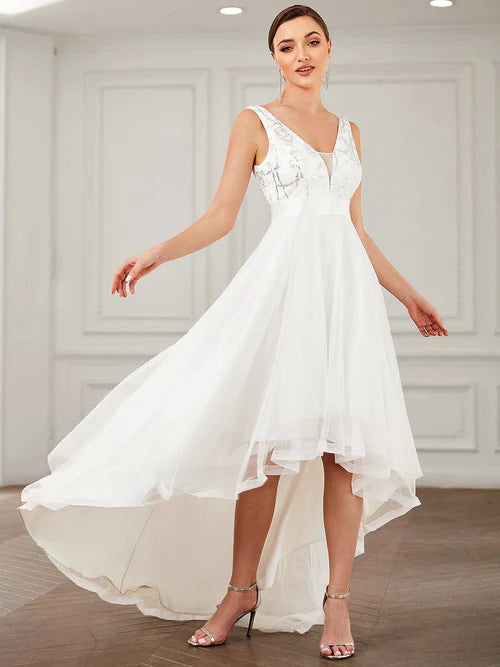 Fashionable and elegant sequin application for high and low sheer wedding dresses