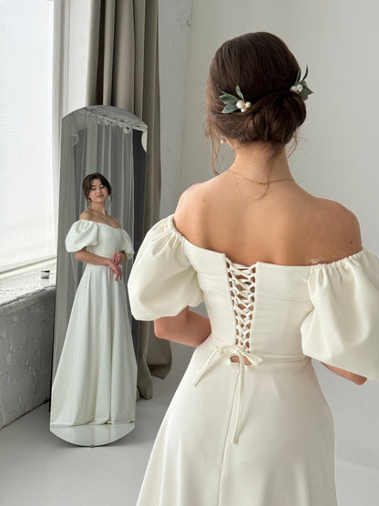 A Modest Dress With Short Sleeves An Ivory-colored Dress A Maxi Wedding Dress A Simple Wedding Dress