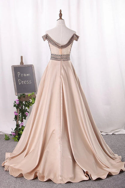 New sexy off the shoulder ball dress with beaded lines and tight satin finish