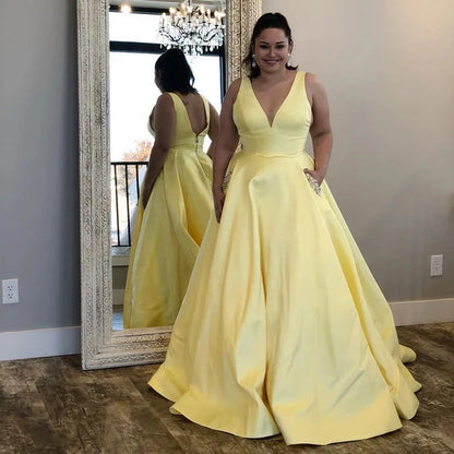 Plus size A yellow satin V-neck beaded pocket ball dress