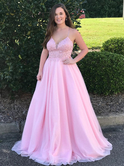 Large pink sheer spaghetti strap with V-neck princess floor length dress paired with lace ball dress