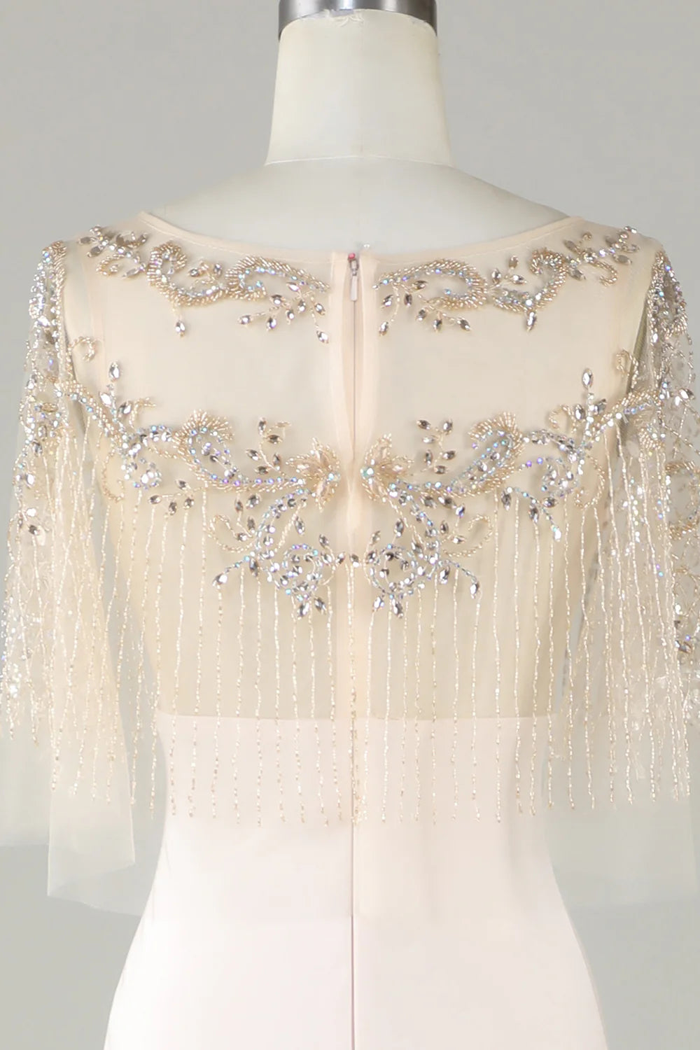 Sparkling and elegant champagne colored boat neck beaded mermaid long ball dress