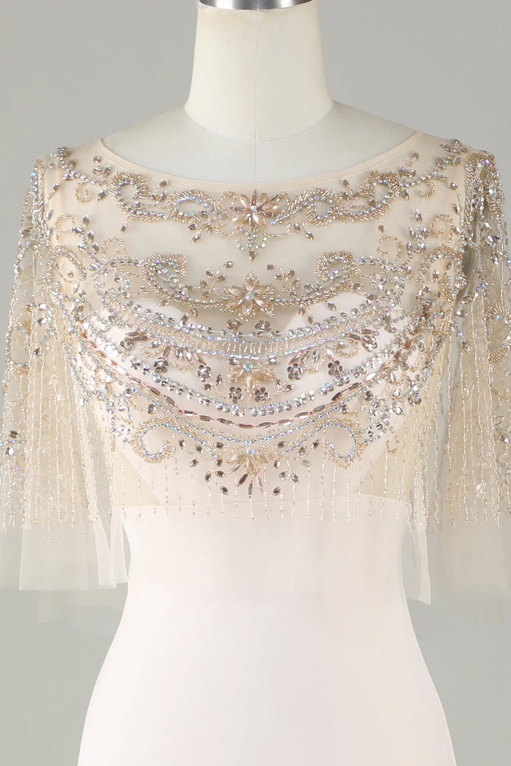 Sparkling and elegant champagne colored boat neck beaded mermaid long ball dress