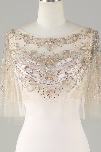 Sparkling and elegant champagne colored boat neck beaded mermaid long ball dress