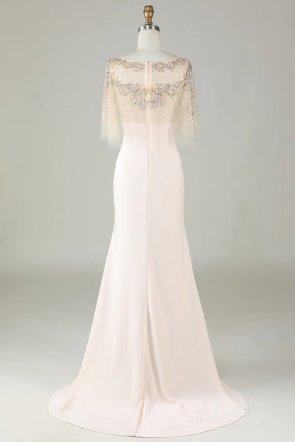 Sparkling and elegant champagne colored boat neck beaded mermaid long ball dress