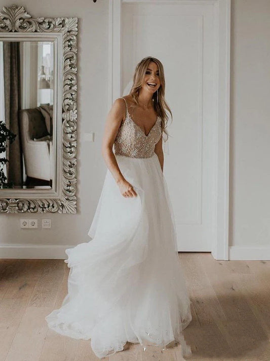 Diamond shoulder strap with full pearl embellishment neckline wedding dress paired with sequin sheer wedding dress