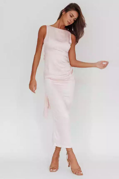 The eye-catching satin fabric features a slit at the back, a semi lined bow detail, and Bridesmaid Dresses