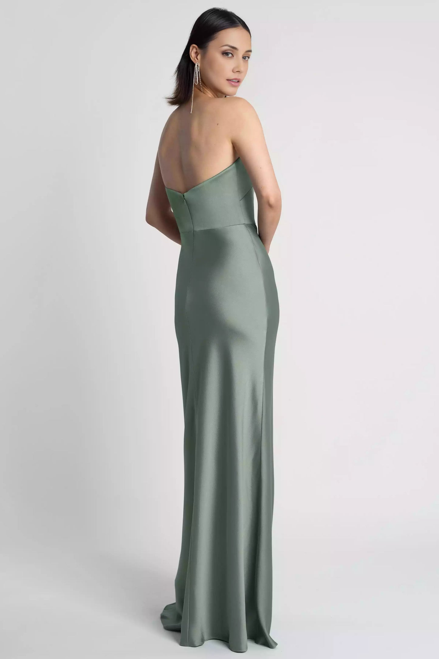 The fashionable satin off shoulder neckline and tight diagonal cut skirt showcase the timeless beauty of Evening Dresses