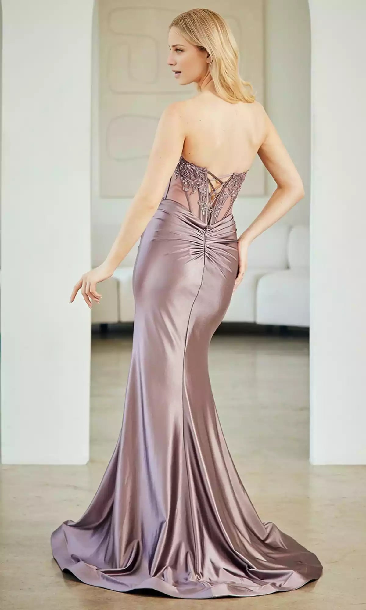 The stunning strapless long sheer corset with tight back straps, high slit, and small tail adds elegance to the Prom Dresses