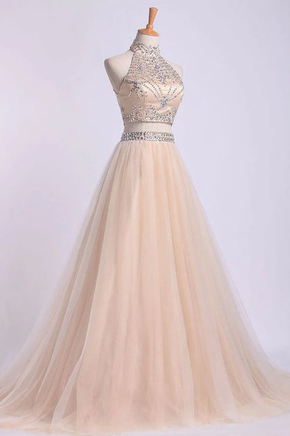 Two piece elegant high necked ball dress with A-line sheer beads