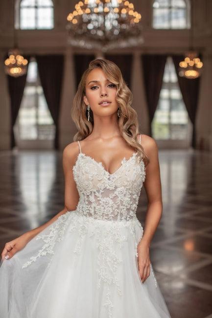 Long A-line V-neck sheer sleeveless lace bridal gown