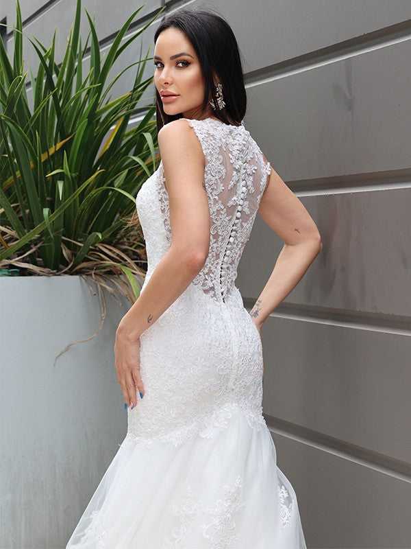 Mermaid shaped sheer lace V-neck sleeveless sweeping collar brush train wedding dress