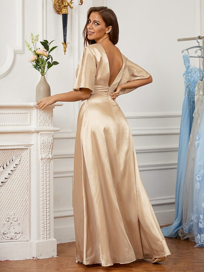 A-line princess style silk pleated V-neck short sleeved ground length dress