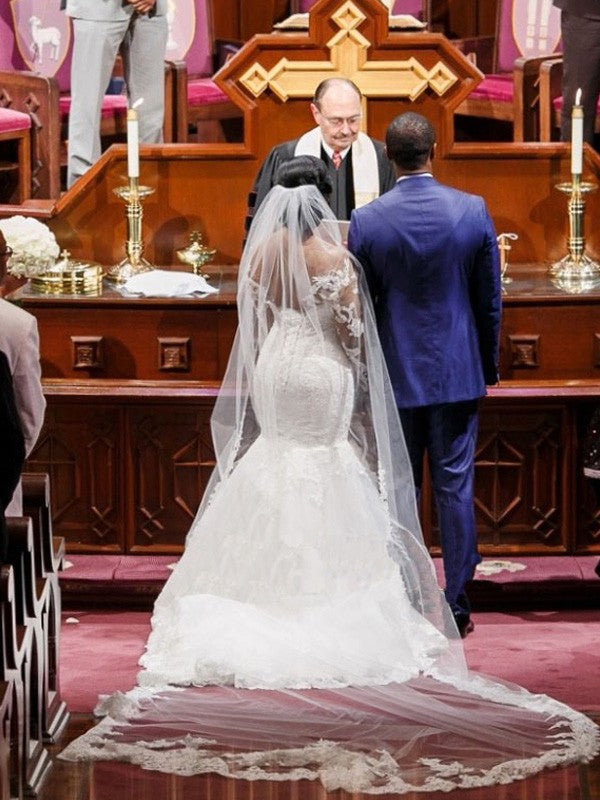 Small mermaid long sleeved sweet sheer wedding dress