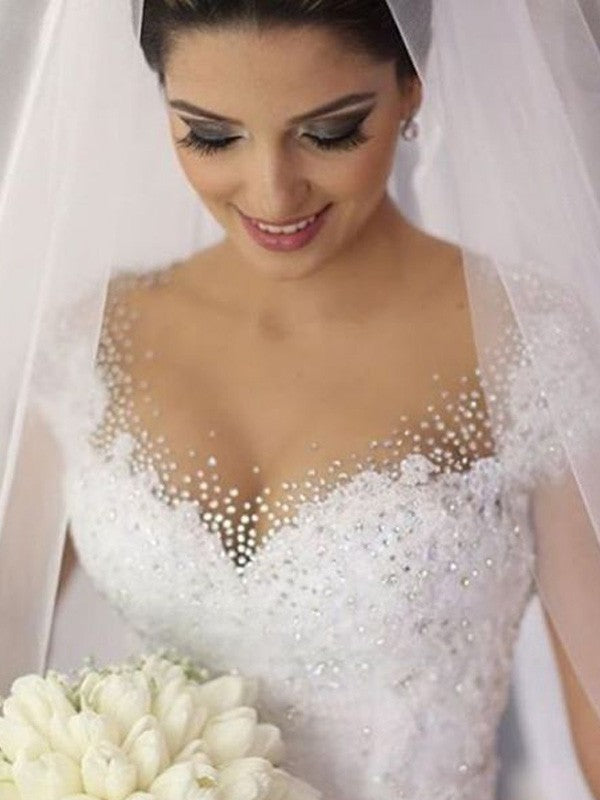 Sleeveless sexy V-neck beaded floor mopping sheer wedding dress