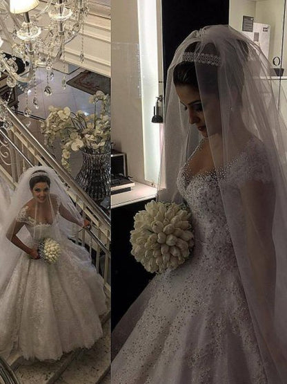 Sleeveless sexy V-neck beaded floor mopping sheer wedding dress