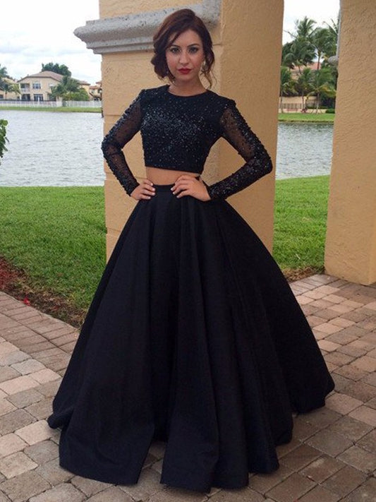 Elegant long sleeved floor sweeping satin beaded dress