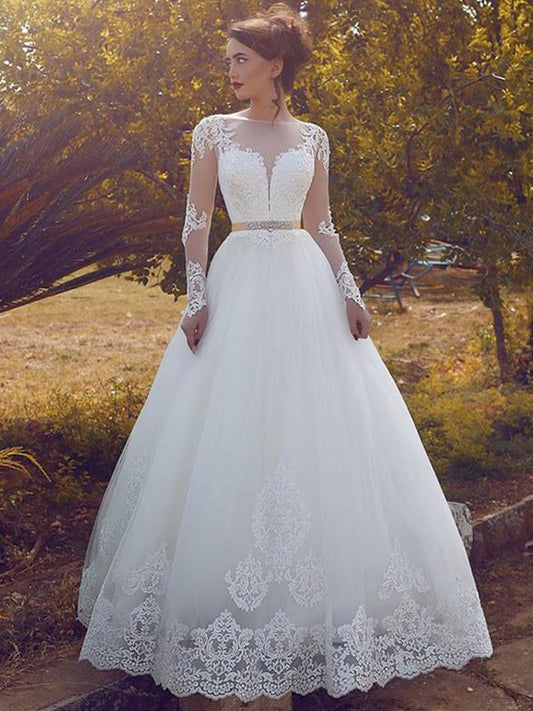 Sweet and sexy sheer long sleeved floor mopping wedding dress