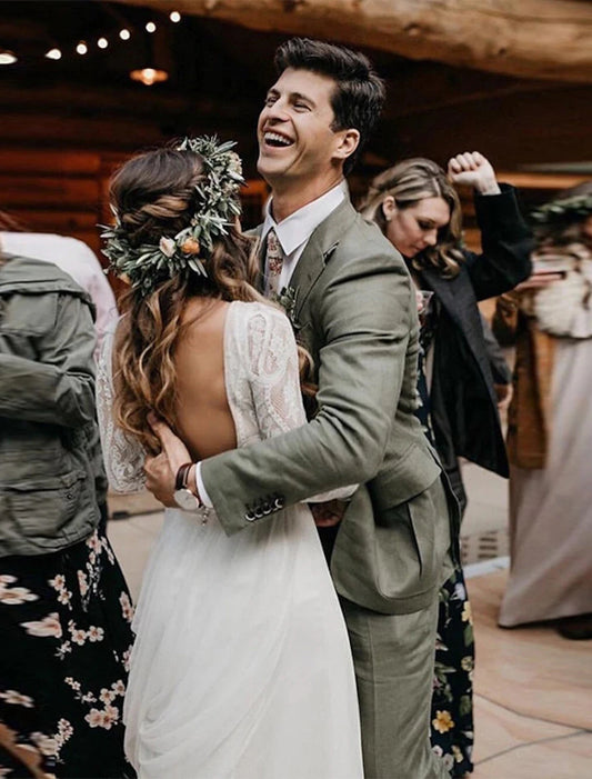 Beach backless bohemian style wedding dress A-line low round neck long sleeved brush lace bridal dress with pleats
