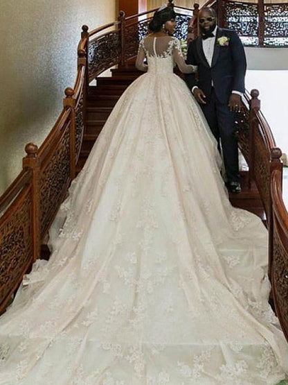 Ball Gown Bateau Long sleeved and floor length applique satin wedding dress